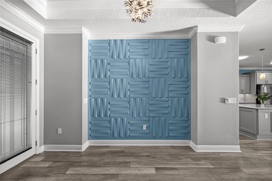 GOLF COURSE VIEW! WHOLE HOUSE GENERATOR! SOLAR TUBES! ENCLOSED on  in Florida - for sale on GolfHomes.com, golf home, golf lot