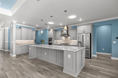 GOLF COURSE VIEW! WHOLE HOUSE GENERATOR! SOLAR TUBES! ENCLOSED on  in Florida - for sale on GolfHomes.com, golf home, golf lot