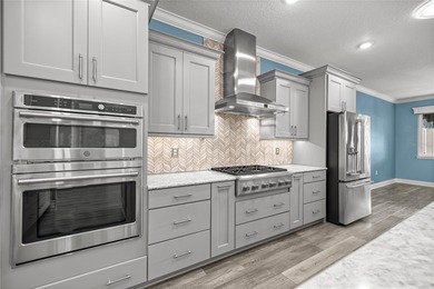 GOLF COURSE VIEW! WHOLE HOUSE GENERATOR! SOLAR TUBES! ENCLOSED on  in Florida - for sale on GolfHomes.com, golf home, golf lot