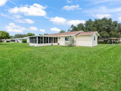 Welcome to this charming 2 bedroom, 2 bath ranch home located in on The Links of Spruce Creek in Florida - for sale on GolfHomes.com, golf home, golf lot