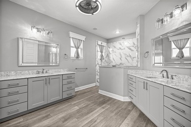 GOLF COURSE VIEW! WHOLE HOUSE GENERATOR! SOLAR TUBES! ENCLOSED on  in Florida - for sale on GolfHomes.com, golf home, golf lot