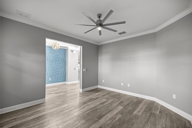 GOLF COURSE VIEW! WHOLE HOUSE GENERATOR! SOLAR TUBES! ENCLOSED on  in Florida - for sale on GolfHomes.com, golf home, golf lot