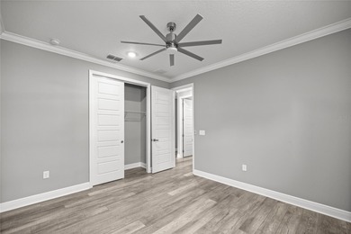 GOLF COURSE VIEW! WHOLE HOUSE GENERATOR! SOLAR TUBES! ENCLOSED on  in Florida - for sale on GolfHomes.com, golf home, golf lot