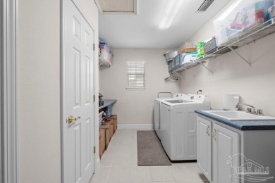 The cutest 3 bedroom 2 bath brick home with a screened in porch on Tiger Point Golf and Country Club in Florida - for sale on GolfHomes.com, golf home, golf lot