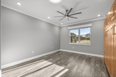 GOLF COURSE VIEW! WHOLE HOUSE GENERATOR! SOLAR TUBES! ENCLOSED on  in Florida - for sale on GolfHomes.com, golf home, golf lot