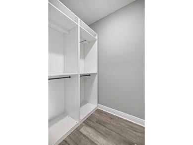 GOLF COURSE VIEW! WHOLE HOUSE GENERATOR! SOLAR TUBES! ENCLOSED on  in Florida - for sale on GolfHomes.com, golf home, golf lot