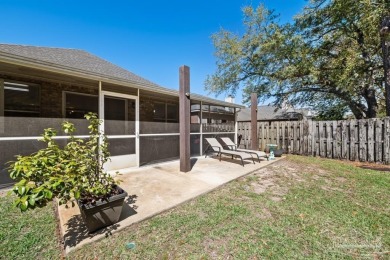 The cutest 3 bedroom 2 bath brick home with a screened in porch on Tiger Point Golf and Country Club in Florida - for sale on GolfHomes.com, golf home, golf lot
