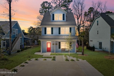 Welcome to your own modern, coastal retreat at 1163 N. Caswell on The Lakes Country Club in North Carolina - for sale on GolfHomes.com, golf home, golf lot