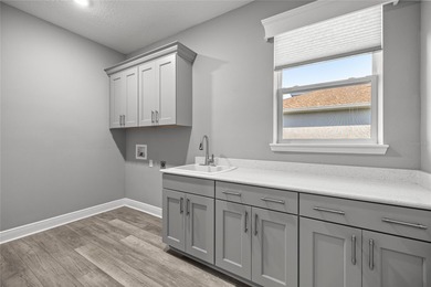 GOLF COURSE VIEW! WHOLE HOUSE GENERATOR! SOLAR TUBES! ENCLOSED on  in Florida - for sale on GolfHomes.com, golf home, golf lot