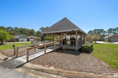 The cutest 3 bedroom 2 bath brick home with a screened in porch on Tiger Point Golf and Country Club in Florida - for sale on GolfHomes.com, golf home, golf lot