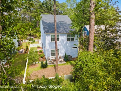 Welcome to your own modern, coastal retreat at 1163 N. Caswell on The Lakes Country Club in North Carolina - for sale on GolfHomes.com, golf home, golf lot