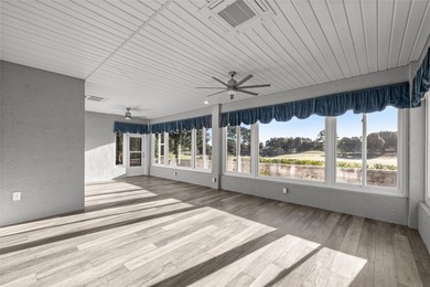 GOLF COURSE VIEW! WHOLE HOUSE GENERATOR! SOLAR TUBES! ENCLOSED on  in Florida - for sale on GolfHomes.com, golf home, golf lot