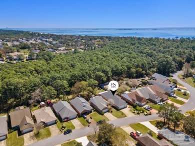 The cutest 3 bedroom 2 bath brick home with a screened in porch on Tiger Point Golf and Country Club in Florida - for sale on GolfHomes.com, golf home, golf lot