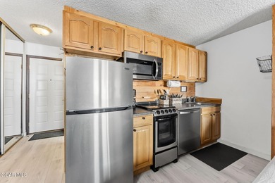 Turnkey mountain escape at The Inn at SilverCreek! This on Headwaters Golf Course At Granby Ranch in Colorado - for sale on GolfHomes.com, golf home, golf lot