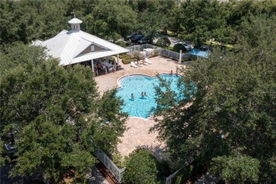 These townhouse-style abodes have NEW ROOFS IN 2021 & their on Harmony Golf Preserve in Florida - for sale on GolfHomes.com, golf home, golf lot