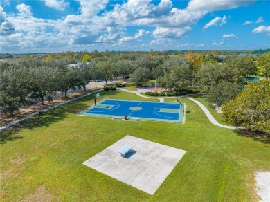 These townhouse-style abodes have NEW ROOFS IN 2021 & their on Harmony Golf Preserve in Florida - for sale on GolfHomes.com, golf home, golf lot
