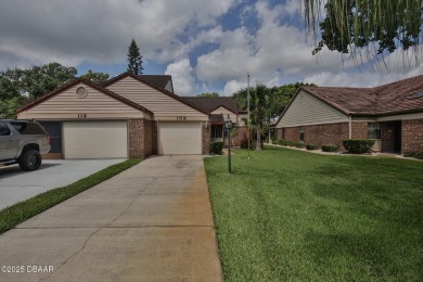 This ONE-STORY GATED townhome is a FABULOUS FIND! It has a great on The Club At Pelican Bay - North Course in Florida - for sale on GolfHomes.com, golf home, golf lot