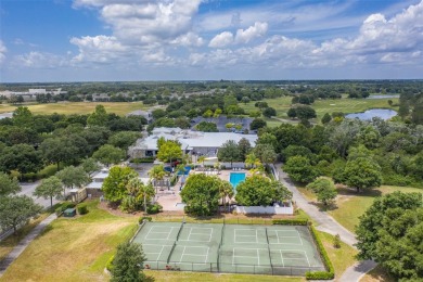 These townhouse-style abodes have NEW ROOFS IN 2021 & their on Harmony Golf Preserve in Florida - for sale on GolfHomes.com, golf home, golf lot