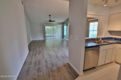 This ONE-STORY GATED townhome is a FABULOUS FIND! It has a great on The Club At Pelican Bay - North Course in Florida - for sale on GolfHomes.com, golf home, golf lot