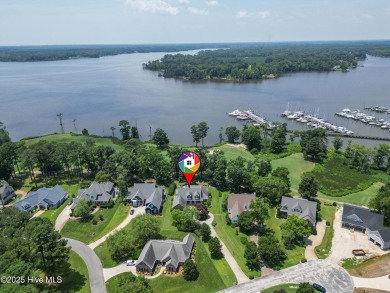 Experience the best of waterfront and golf course living at 107 on Sound Golf Links at Albemarle Plantation in North Carolina - for sale on GolfHomes.com, golf home, golf lot