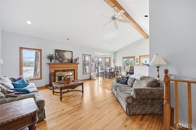 Lake life is calling--and this one answers in style! This on Raintree Country Club in Missouri - for sale on GolfHomes.com, golf home, golf lot