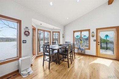 Lake life is calling--and this one answers in style! This on Raintree Country Club in Missouri - for sale on GolfHomes.com, golf home, golf lot