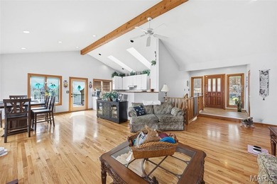 Lake life is calling--and this one answers in style! This on Raintree Country Club in Missouri - for sale on GolfHomes.com, golf home, golf lot