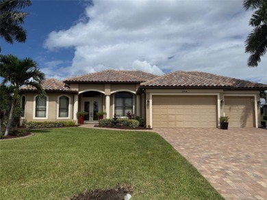 STUNNING CUSTOM BUILT HOME IN BURNT STORE LAKES THAT ISNT IN A on Burnt Store Golf Club in Florida - for sale on GolfHomes.com, golf home, golf lot