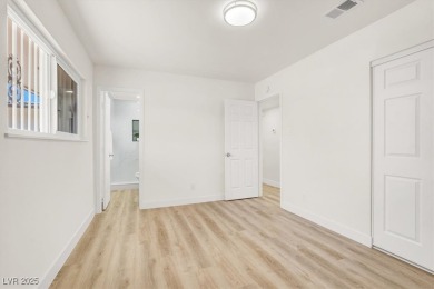 Beautiful single-story home on an extra large lot located right on Desert Rose Golf Course in Nevada - for sale on GolfHomes.com, golf home, golf lot