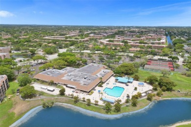 Washer/dryer in unit.Spacious/furnished 2 bed/2 bath condo on Sunrise Lakes Phase IV Golf Course in Florida - for sale on GolfHomes.com, golf home, golf lot