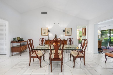 Sparkling lake views! Nestled in the Sanderling area of Quail on Quail Ridge Golf Course and Country Club in Florida - for sale on GolfHomes.com, golf home, golf lot