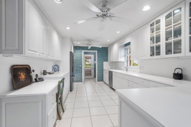Sparkling lake views! Nestled in the Sanderling area of Quail on Quail Ridge Golf Course and Country Club in Florida - for sale on GolfHomes.com, golf home, golf lot