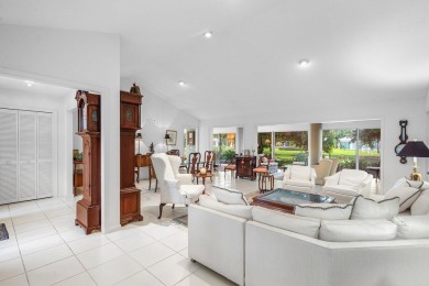 Sparkling lake views! Nestled in the Sanderling area of Quail on Quail Ridge Golf Course and Country Club in Florida - for sale on GolfHomes.com, golf home, golf lot