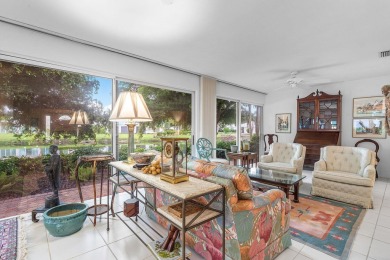 Sparkling lake views! Nestled in the Sanderling area of Quail on Quail Ridge Golf Course and Country Club in Florida - for sale on GolfHomes.com, golf home, golf lot