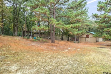 An absolute 3/3/2+ dream home in highly sought after gated on Holly Lake Ranch Golf Club in Texas - for sale on GolfHomes.com, golf home, golf lot