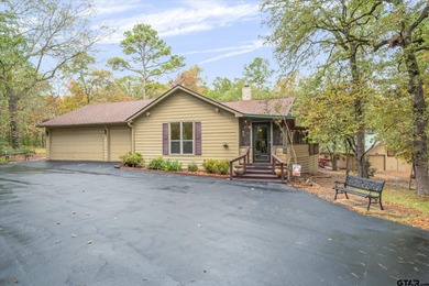 An absolute 3/3/2+ dream home in highly sought after gated on Holly Lake Ranch Golf Club in Texas - for sale on GolfHomes.com, golf home, golf lot