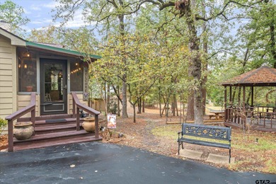 An absolute 3/3/2+ dream home in highly sought after gated on Holly Lake Ranch Golf Club in Texas - for sale on GolfHomes.com, golf home, golf lot