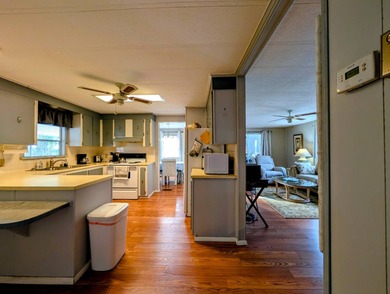 Before I forget to say it,  the GOLF CART comes with the home! on Grasslands Golf and Country Club in Florida - for sale on GolfHomes.com, golf home, golf lot