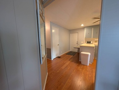 Before I forget to say it,  the GOLF CART comes with the home! on Grasslands Golf and Country Club in Florida - for sale on GolfHomes.com, golf home, golf lot