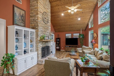 An absolute 3/3/2+ dream home in highly sought after gated on Holly Lake Ranch Golf Club in Texas - for sale on GolfHomes.com, golf home, golf lot