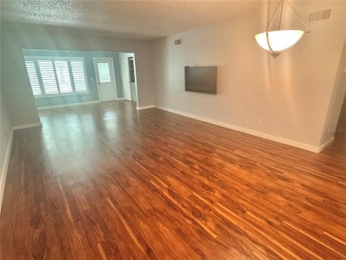 HIGHLY SOUGHT AFTER UPDATED GROUND FLOOR 1415SF CONDO. HIGH-END on On Top Of The World Golf Course in Florida - for sale on GolfHomes.com, golf home, golf lot