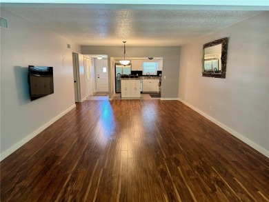 HIGHLY SOUGHT AFTER UPDATED GROUND FLOOR 1415SF CONDO. HIGH-END on On Top Of The World Golf Course in Florida - for sale on GolfHomes.com, golf home, golf lot
