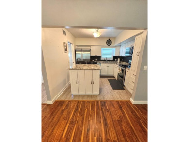 HIGHLY SOUGHT AFTER UPDATED GROUND FLOOR 1415SF CONDO. HIGH-END on On Top Of The World Golf Course in Florida - for sale on GolfHomes.com, golf home, golf lot