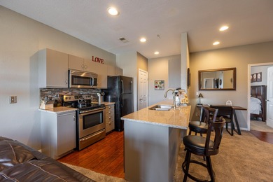 Fully furnished 2-bedroom, 2-bath condo located in sought-after on Holiday Hills Resort and Golf in Missouri - for sale on GolfHomes.com, golf home, golf lot