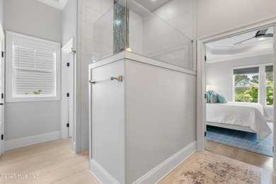 Custom George Crane with expansive golf views and pool. Welcome on Members Club At St. James Plantation in North Carolina - for sale on GolfHomes.com, golf home, golf lot