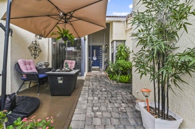 Experience  Florida lifestyle in this beautifully maintained on Deer Creek Golf Club in Florida - for sale on GolfHomes.com, golf home, golf lot