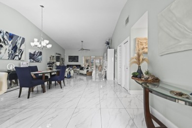 Experience  Florida lifestyle in this beautifully maintained on Deer Creek Golf Club in Florida - for sale on GolfHomes.com, golf home, golf lot