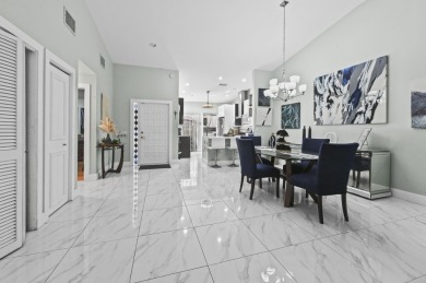 Experience  Florida lifestyle in this beautifully maintained on Deer Creek Golf Club in Florida - for sale on GolfHomes.com, golf home, golf lot