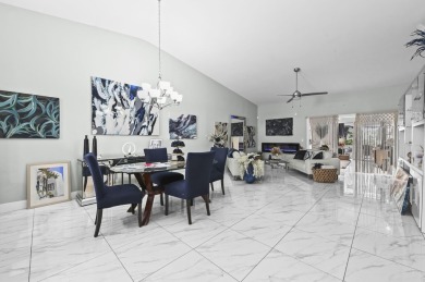 Experience  Florida lifestyle in this beautifully maintained on Deer Creek Golf Club in Florida - for sale on GolfHomes.com, golf home, golf lot