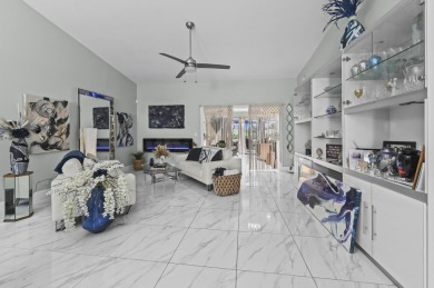 Experience  Florida lifestyle in this beautifully maintained on Deer Creek Golf Club in Florida - for sale on GolfHomes.com, golf home, golf lot